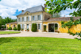 Large French house in the sun with a large garden